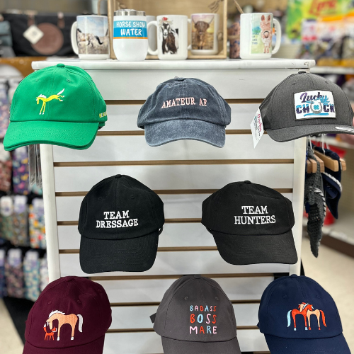 In store display of horse themed ball caps