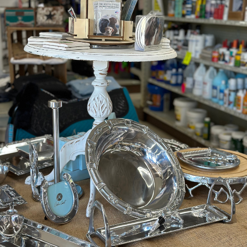 in store display of horse themed gifts including silver plated picture frames, bowls, trays